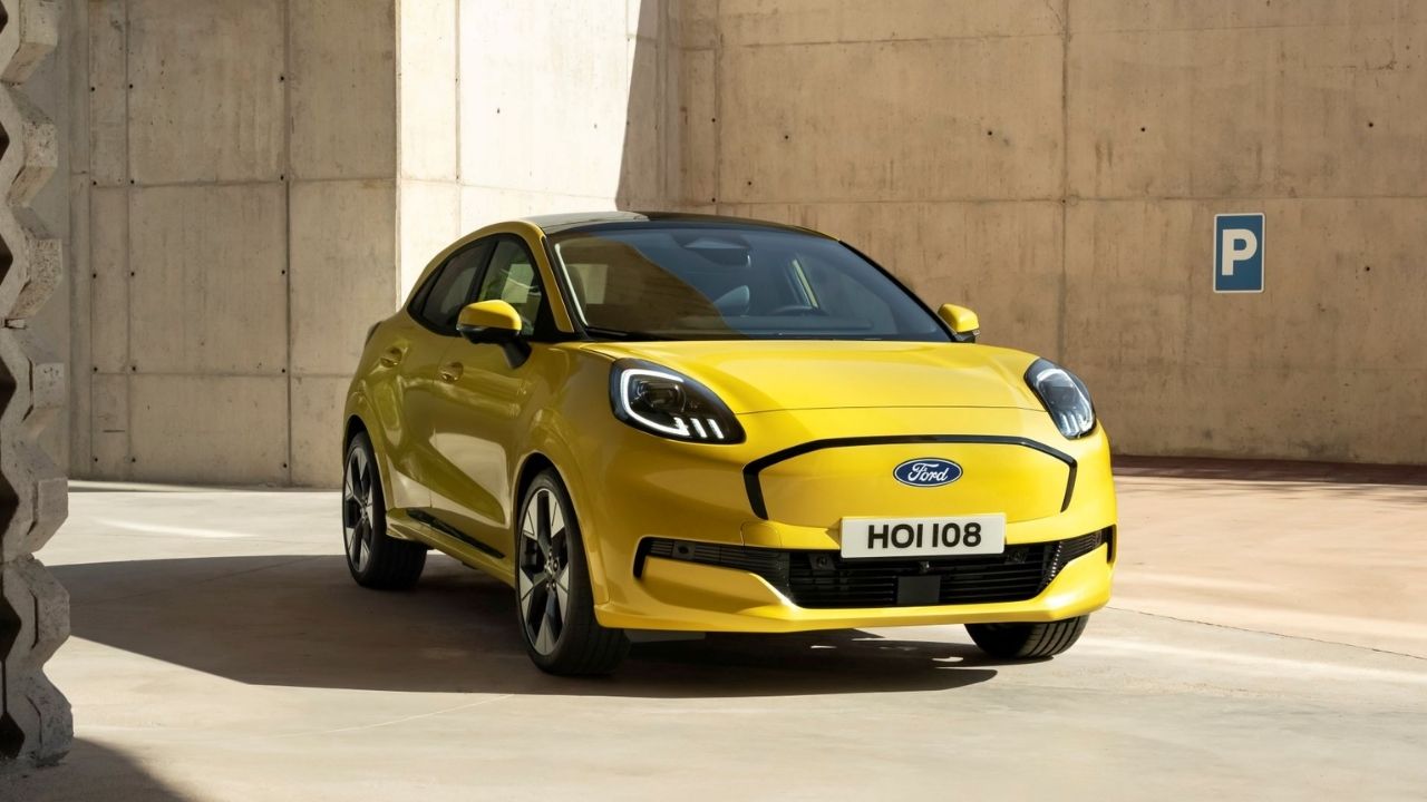 Yellow Ford Vehicle Parked In Concrete Setting