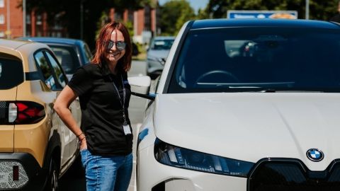 Driveway Colleague Stood Next To Grey BMW Vehicle