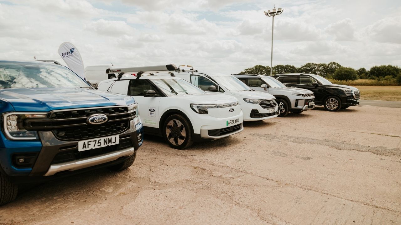 A Row Of 5 Commercial Vehicles Various Brands