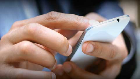 Person On Touchscreen Phone