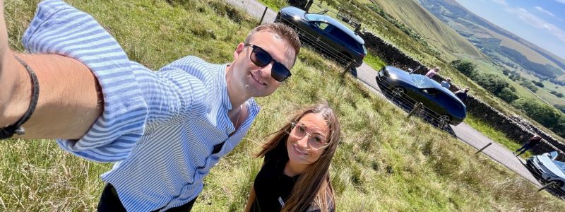 Selfie of Two People by a Country Roadside