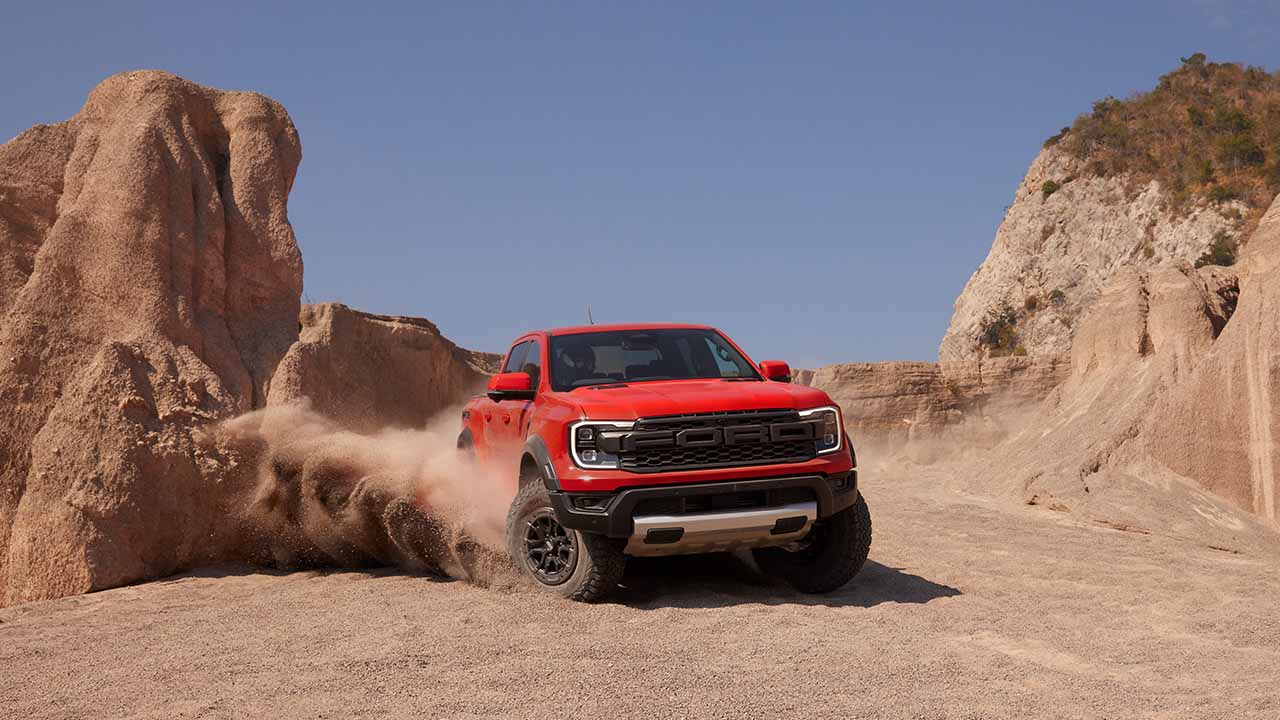 Orange Ford Ranger Raptor Exterior Driving in Desert