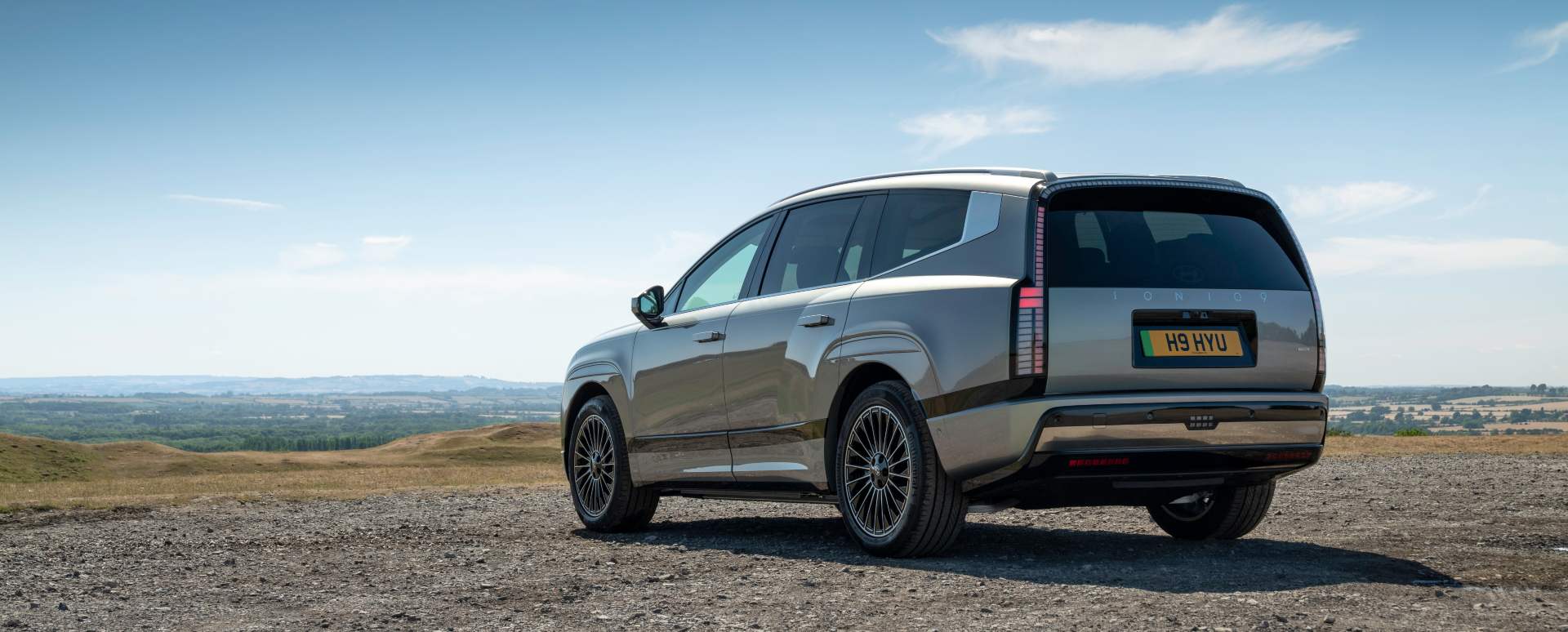 Silver Hyundai IONIQ 9 Exterior Rear Static in Countryside