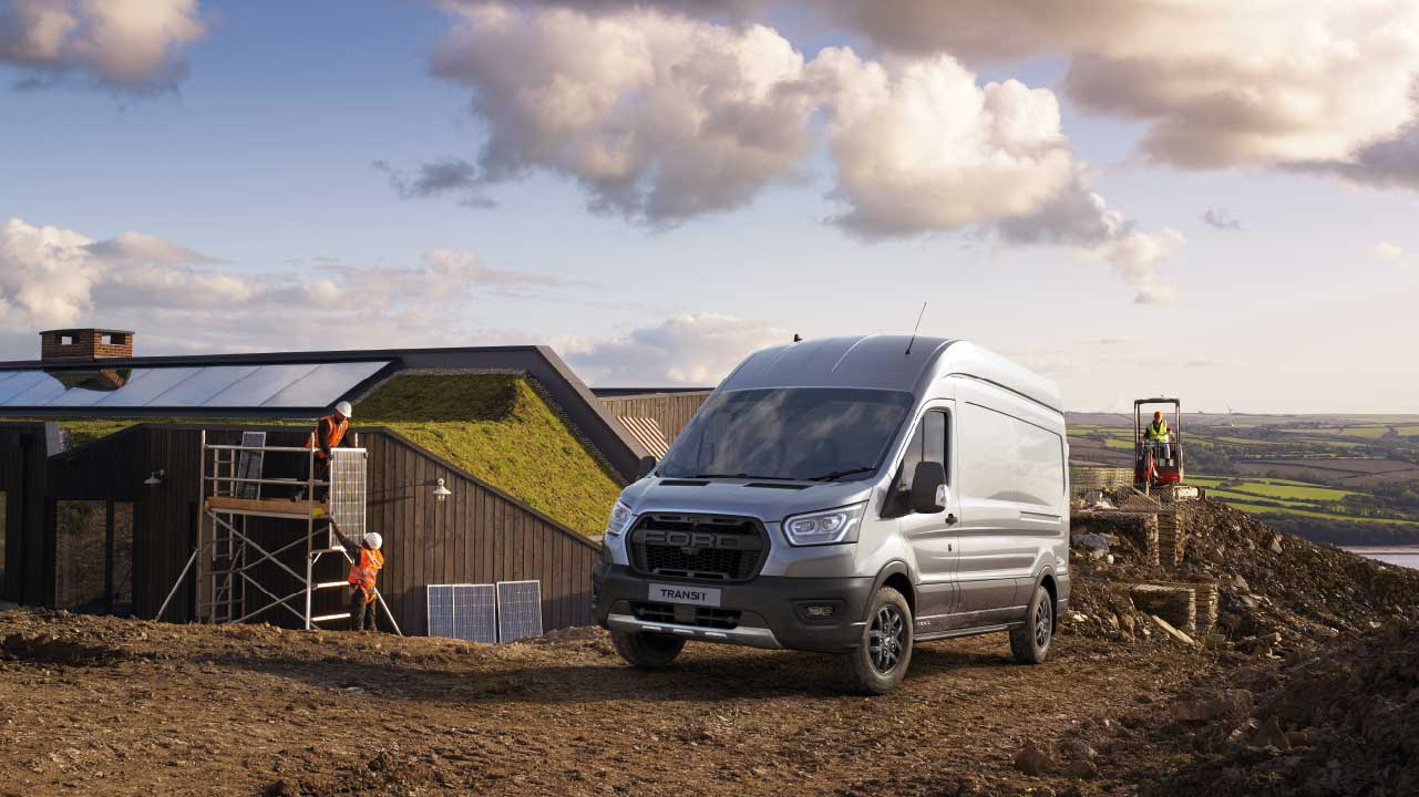 Van Parked In Front Of Work Building