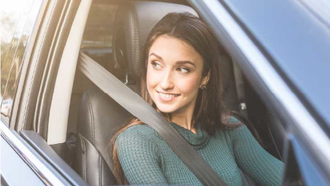 Woman Driving In Car