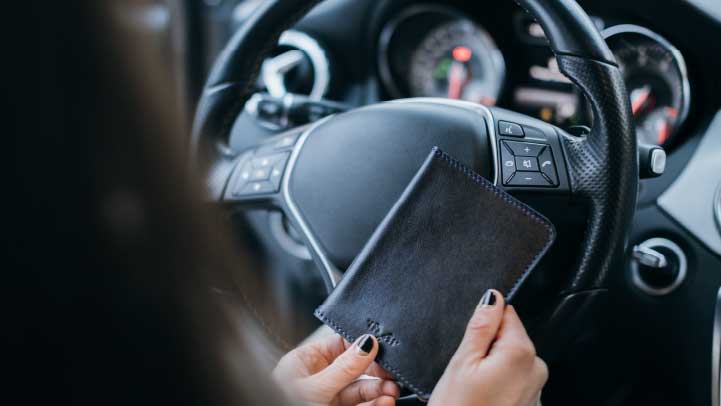 Person with Documentation in Car